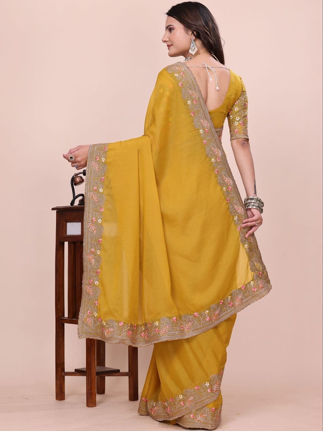 Saanvi Floral Embroidered Poly Georgette Heavy Work Saree thumbnail 2