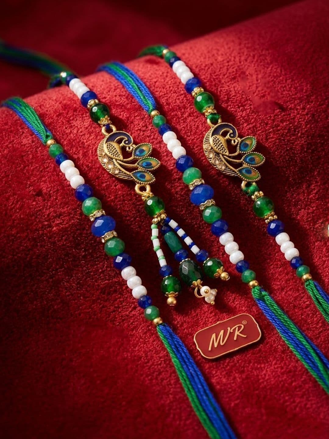 NVR Set Of 4 Green Peacock Design Artificial Beads Thread Rakhi With Roli Chawal thumbnail 5