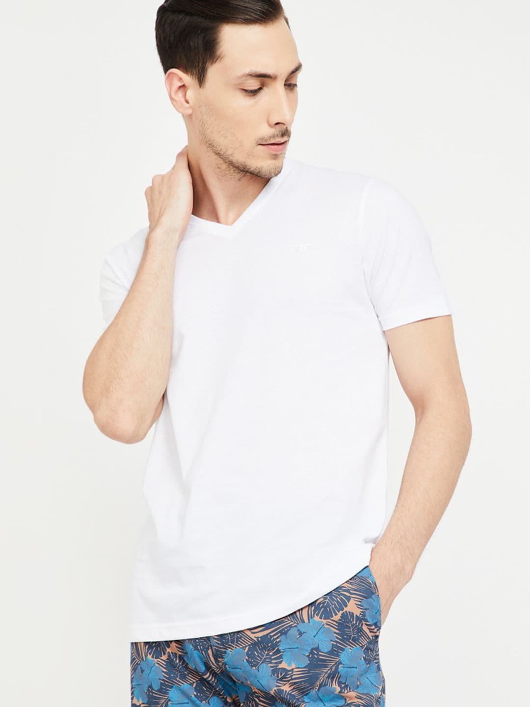 Fame Forever by Lifestyle Men White Solid V-Neck T-shirt - view 1