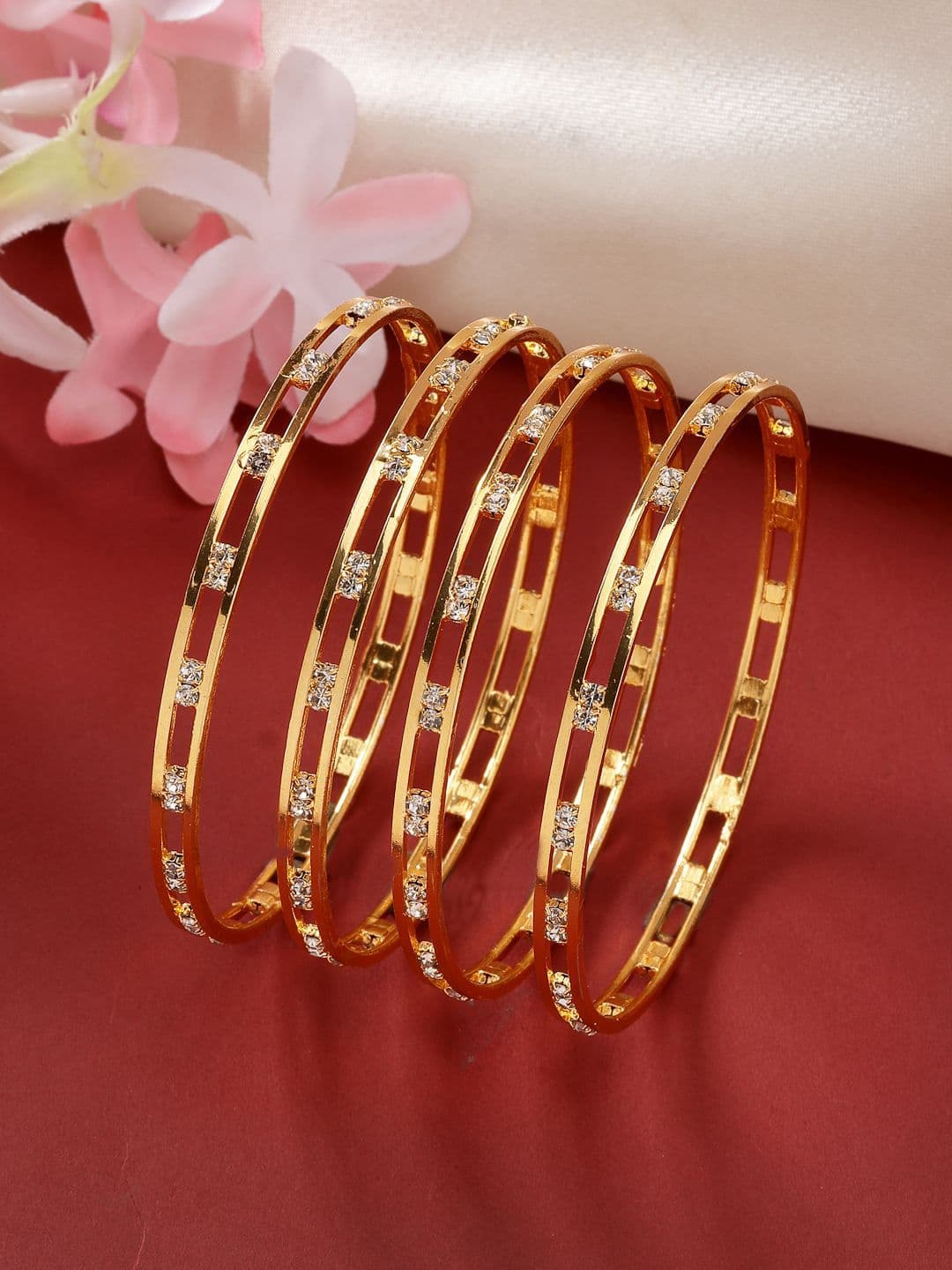 NVR Set Of 4 Gold Plated Cubic Zirconia Stone Studded Bangles - view 1