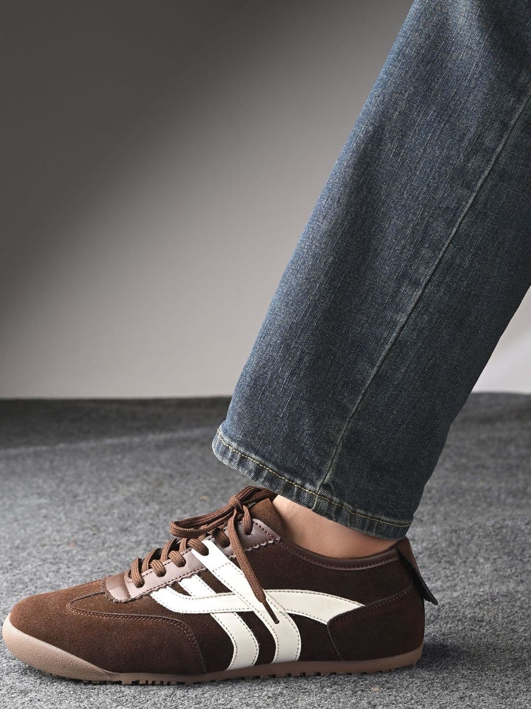 Roadster <p>A pair of brown textured round toe casual sneakers with regular styling has a lace-up c - view 1