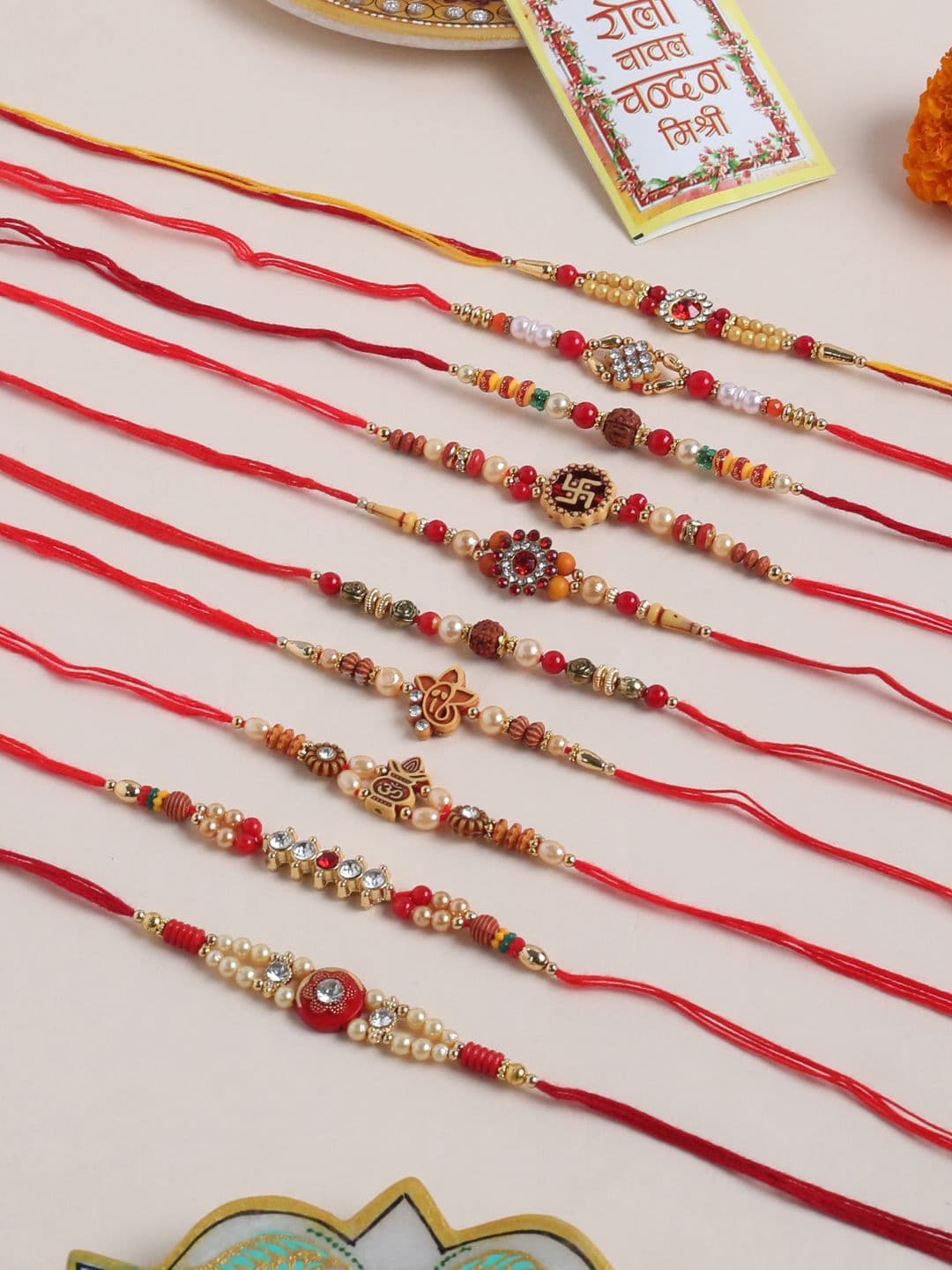 Sangria Set Of 10 Artificial Stones Studded & Beaded Thread Rakhis With Roli Chawal - view 1