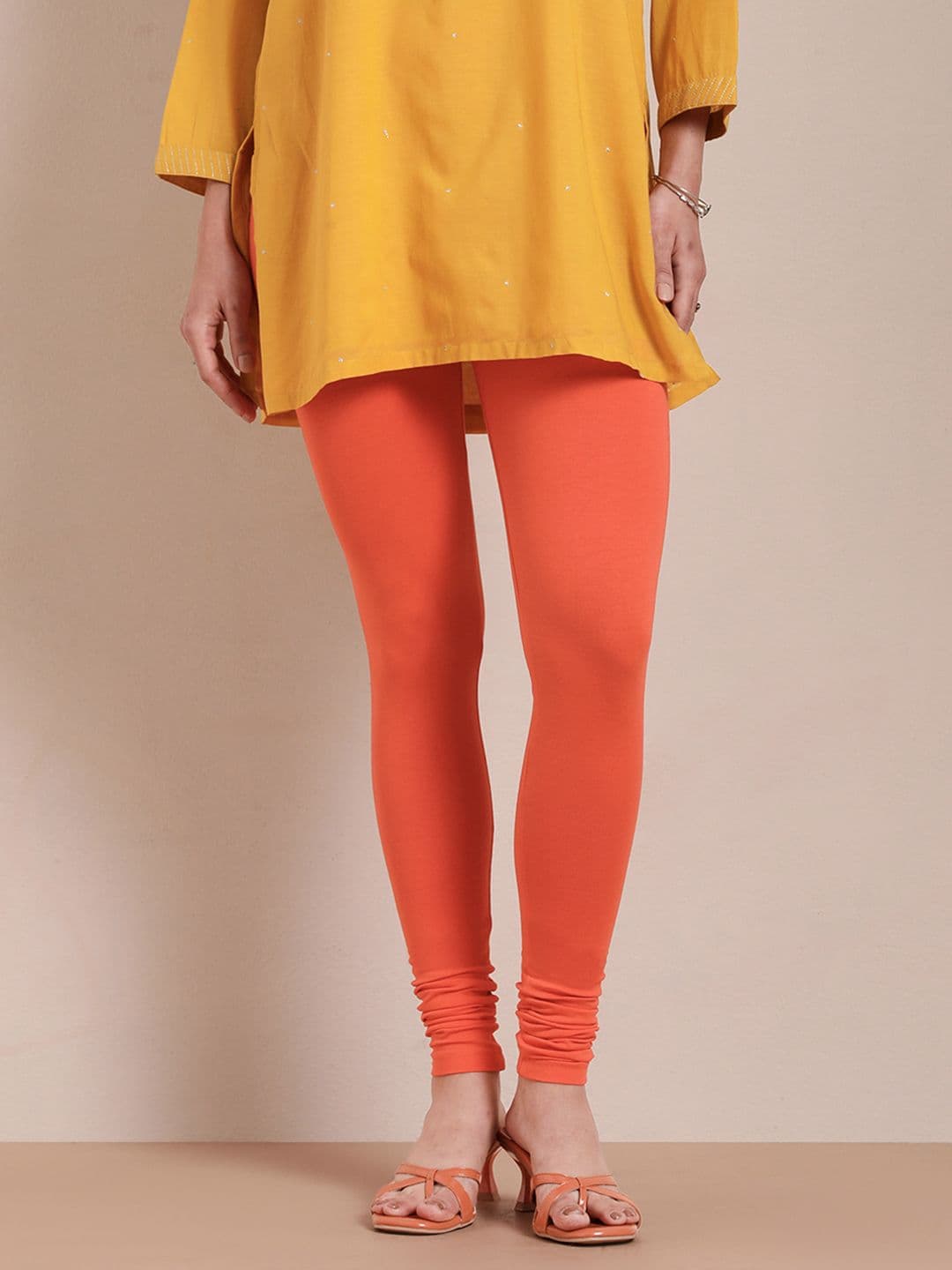 TWIN BIRDS Women Orange Solid Churidar-Length Leggings - view 1