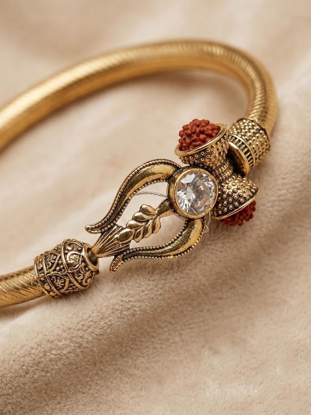 Anouk Gold Plated Trishool Design Rudraksh Rakhi Bracelet With Roli Chawal Chandan Mishri - view 1