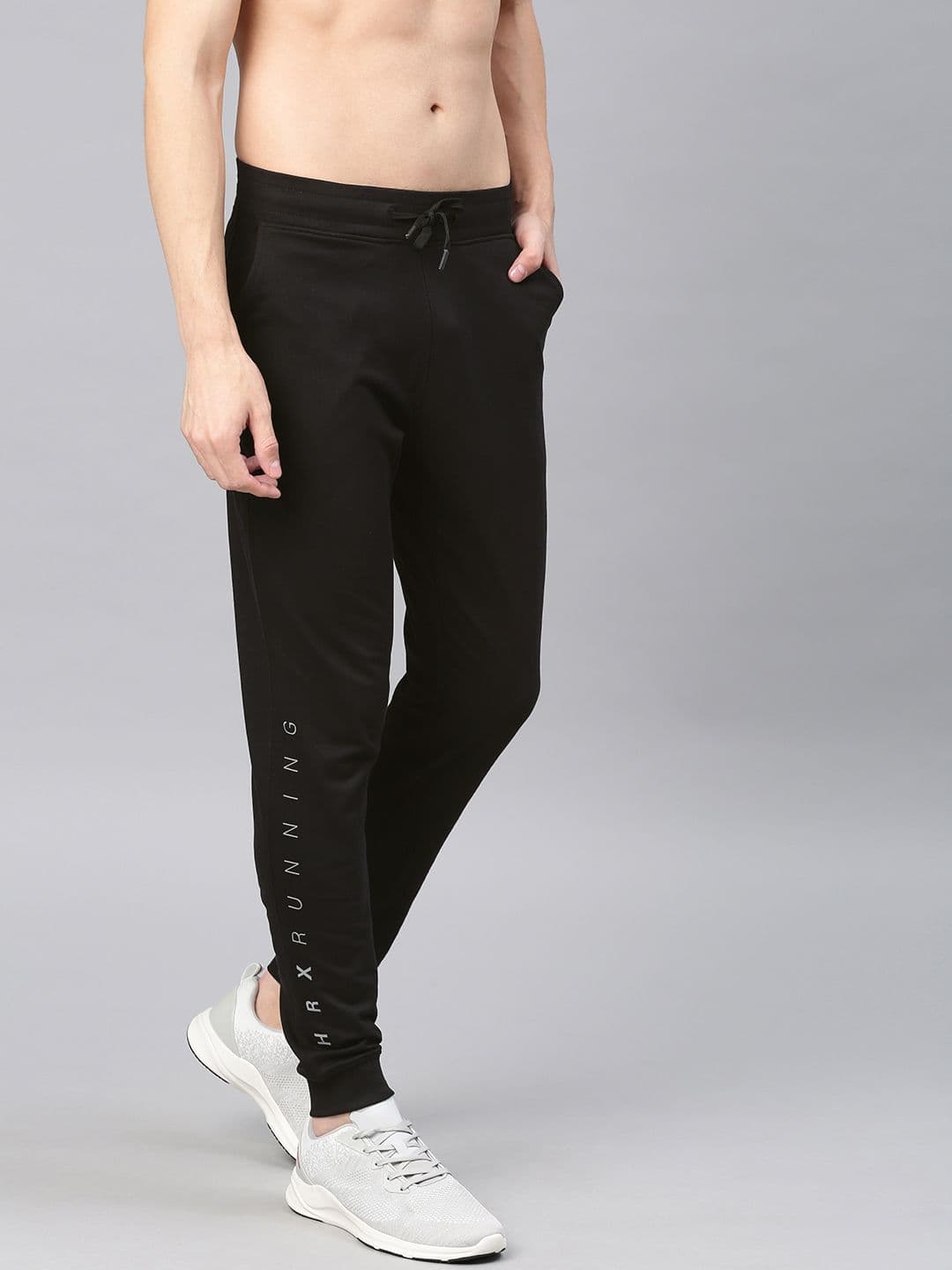 HRX by Hrithik Roshan Men Black Solid Running Anti-Microbial Slim Fit Track Pants - view 1