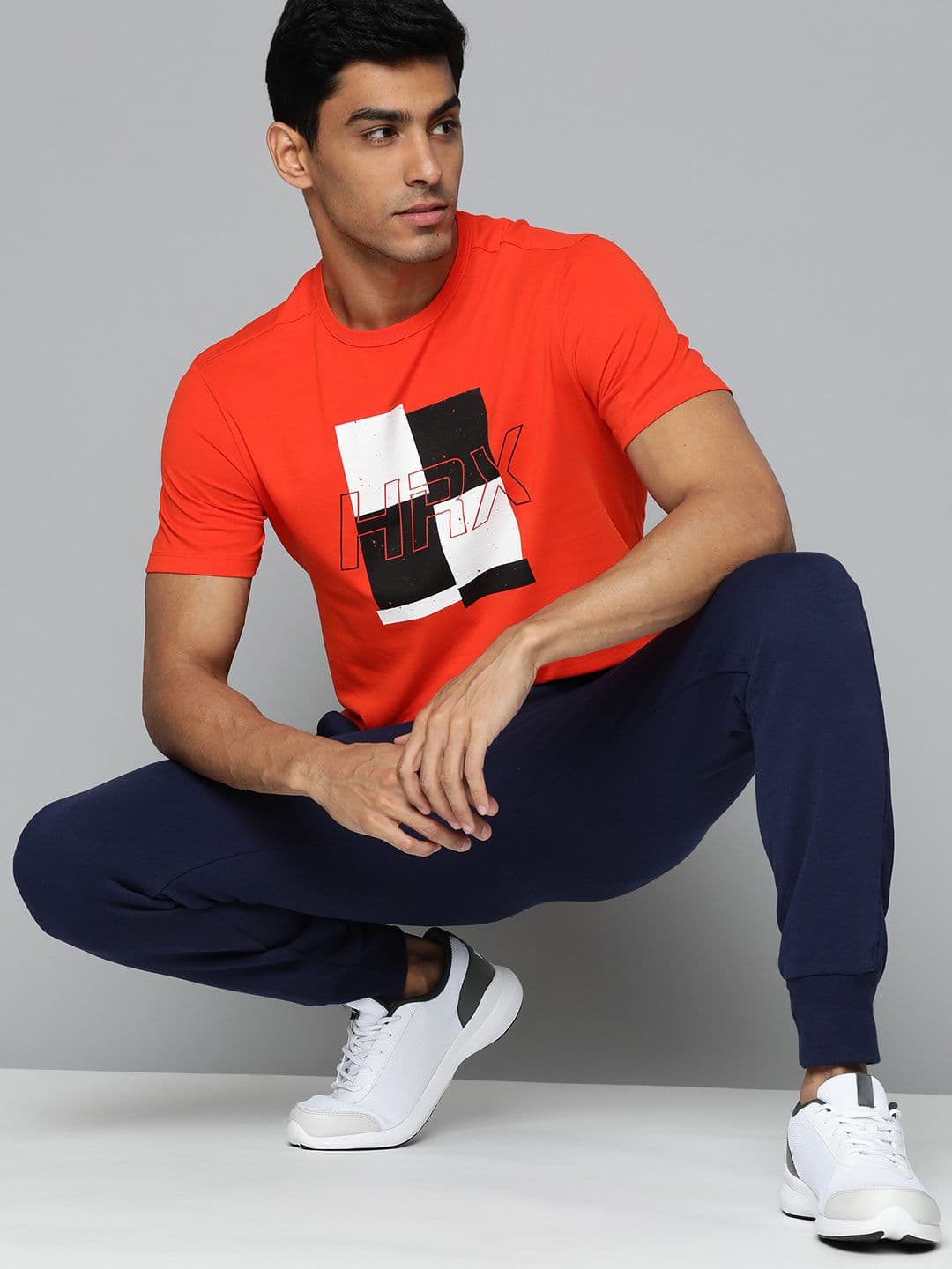 HRX by Hrithik Roshan Men Orange & Black Brand Logo Printed T-shirt - view 1