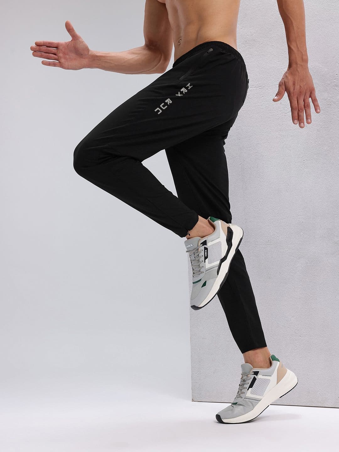HRX by Hrithik Roshan Men Typography Print Panelled Mid-Rise Rapid-Dry Running Track Pants - view 1