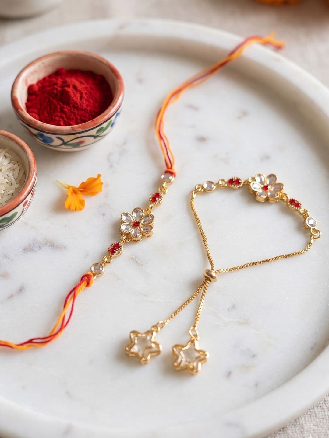 NVR Set Of 2 Gold Toned Kundan Studded Bhaiya Bhabhi Rakhi With Roli Chawal - view 1