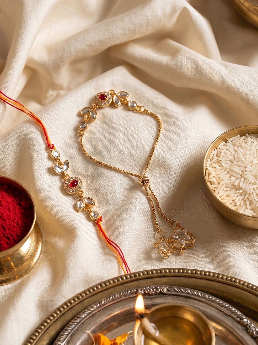 NVR Set Of 2 Kundan Studded Gold Toned Bhaiya Bhabhi Rakhi With Roli Chawal - view 1