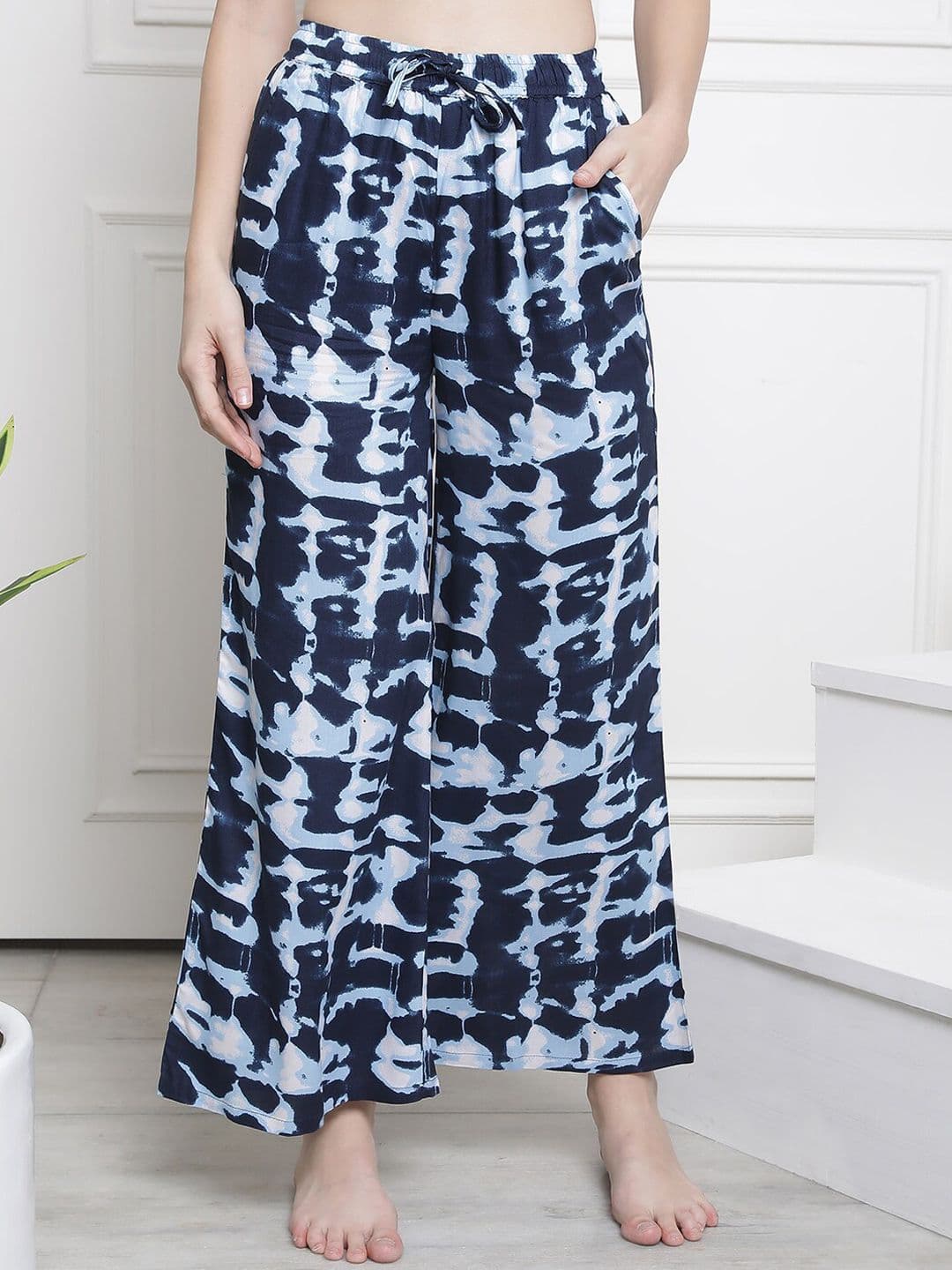 Claura Women Navy Blue Printed Flared Cotton Lounge Pants - view 1