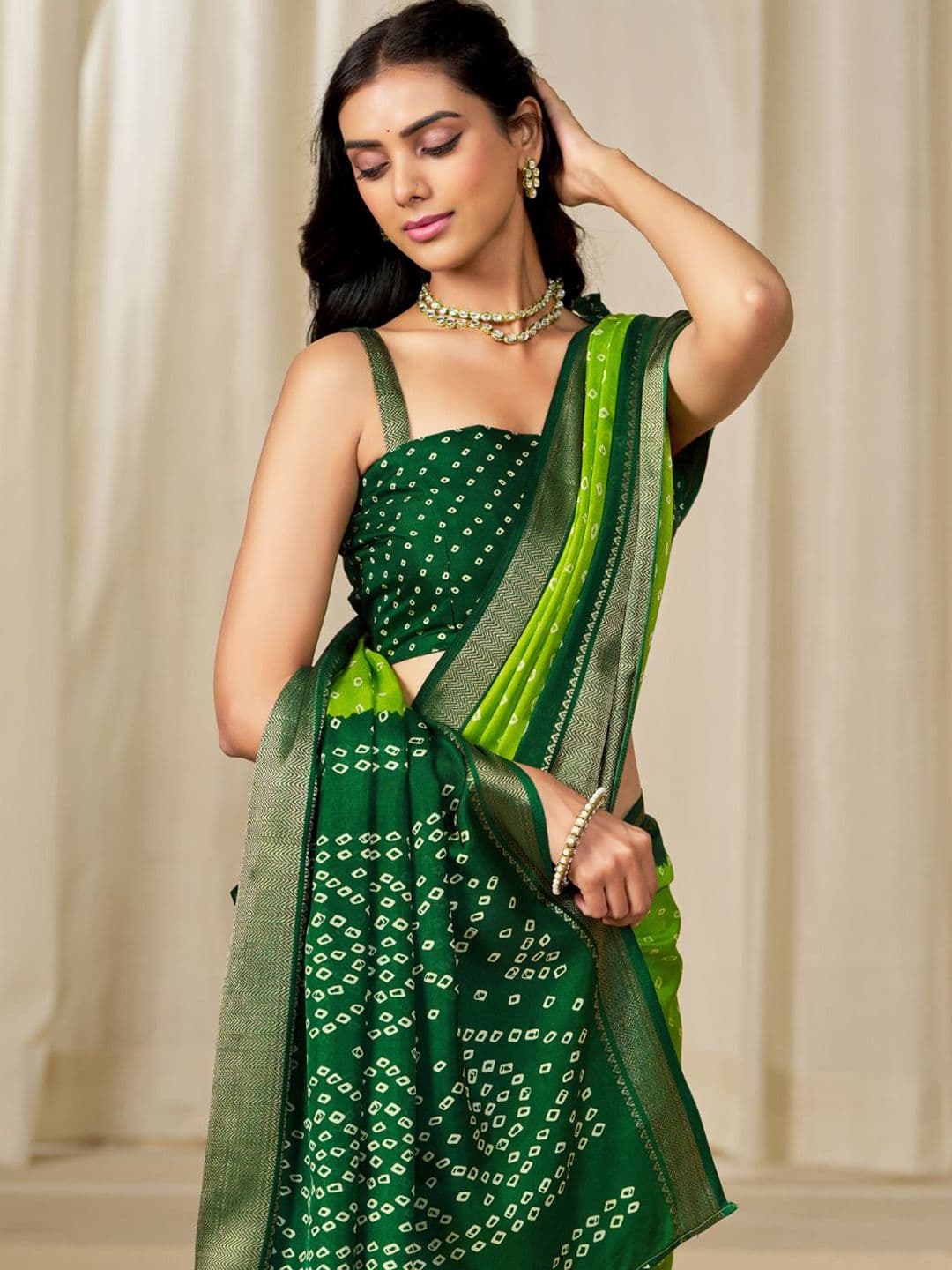 Kalini Women Dola Silk Bandhani Print Zari border Saree - view 1