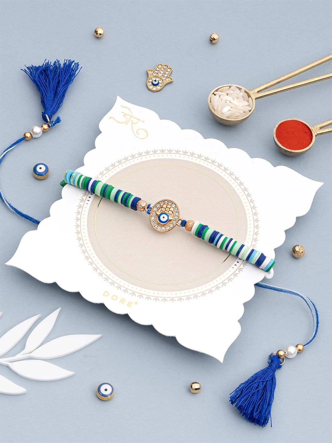Dore Hamsa Evil Eye Rakhi with Blue & Green Clay Disc Beads - view 1