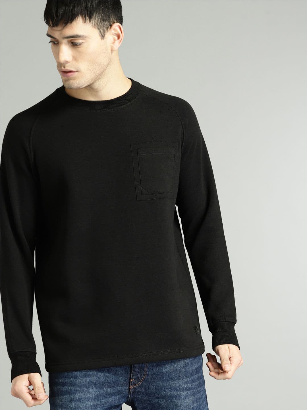 Roadster Men Black Solid Sweatshirt - view 1