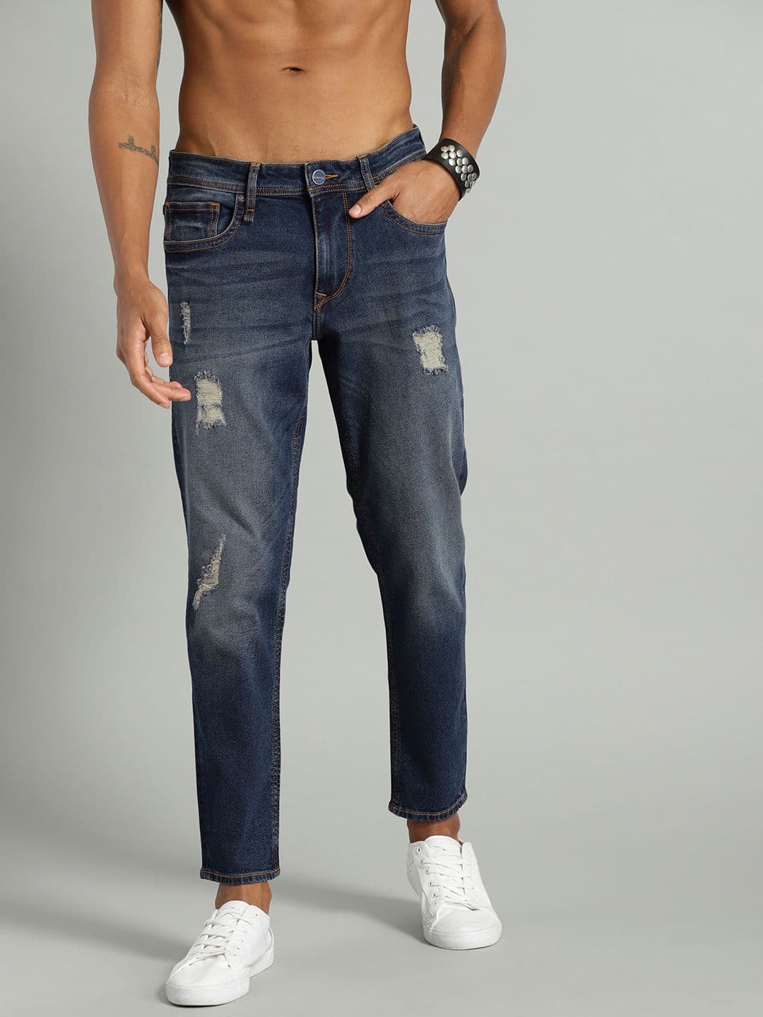 Roadster Men Navy Blue Carrot Regular Fit Mid-Rise Mildly Distressed Stretchable Jeans - view 1